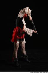 DARINA STANDING POSE WITH SHOTGUN